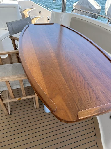 Refinished teak yacht table
